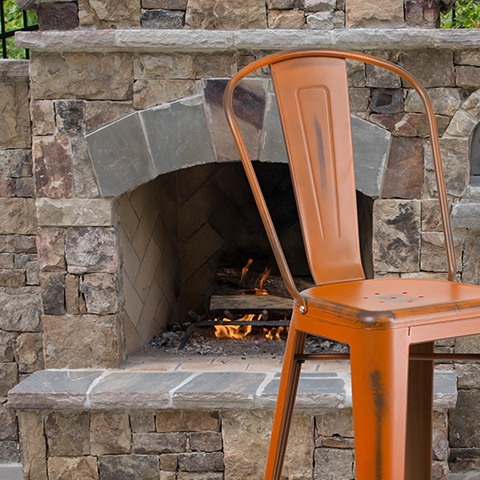 Distressed Orange Metal Stool