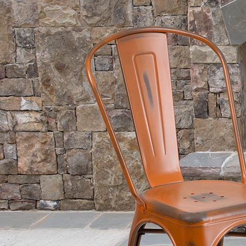 Distressed Orange Metal Chair