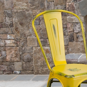 Distressed Yellow Metal Chair