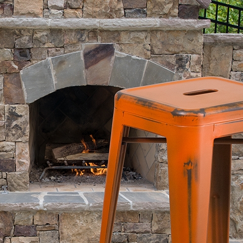 Distressed Orange Metal Stool